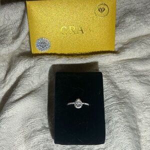 Elegant moissanite tear drop set